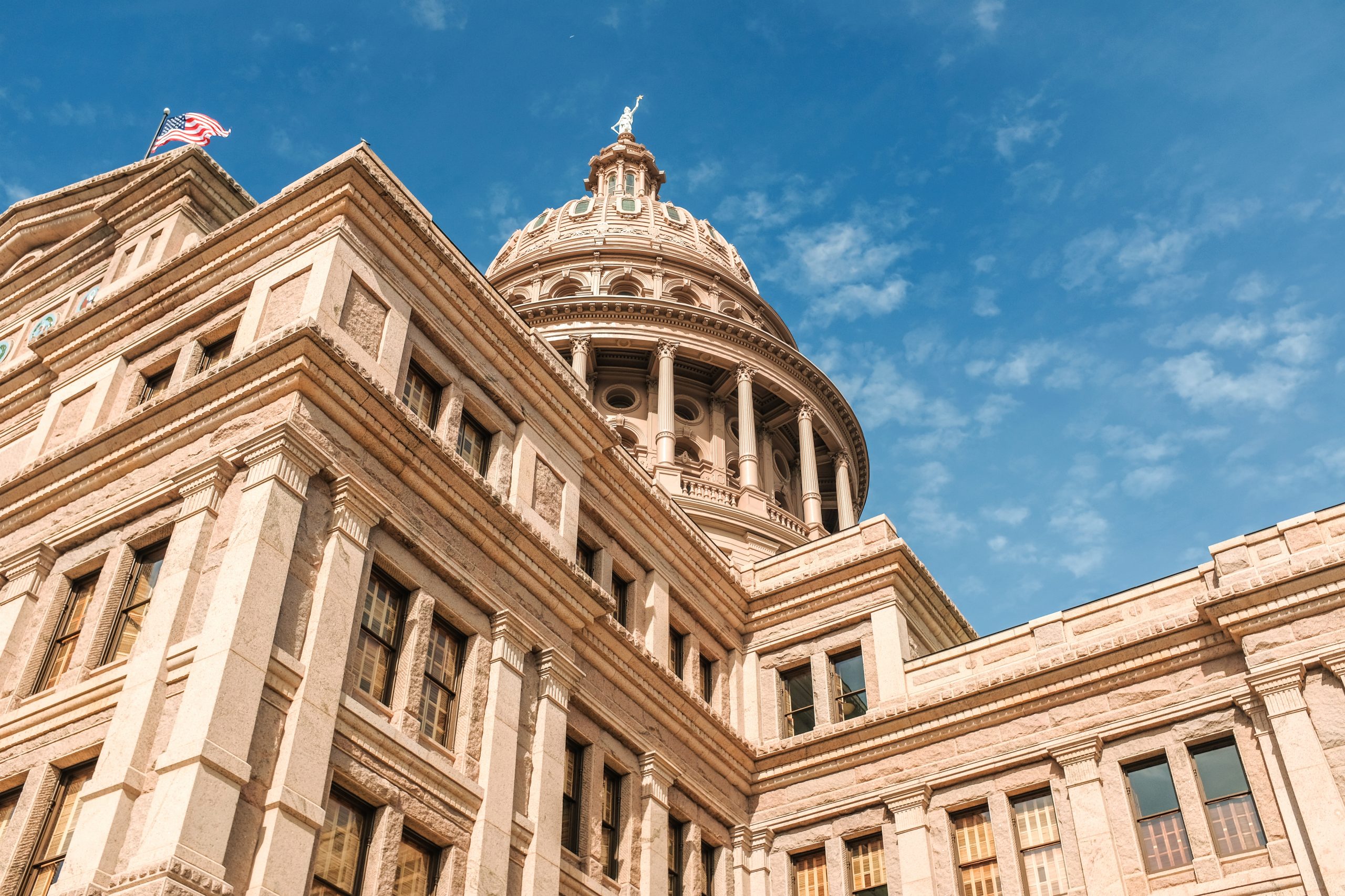 low angle shot texas capitol building blue beautiful sky austin city texas scaled 1